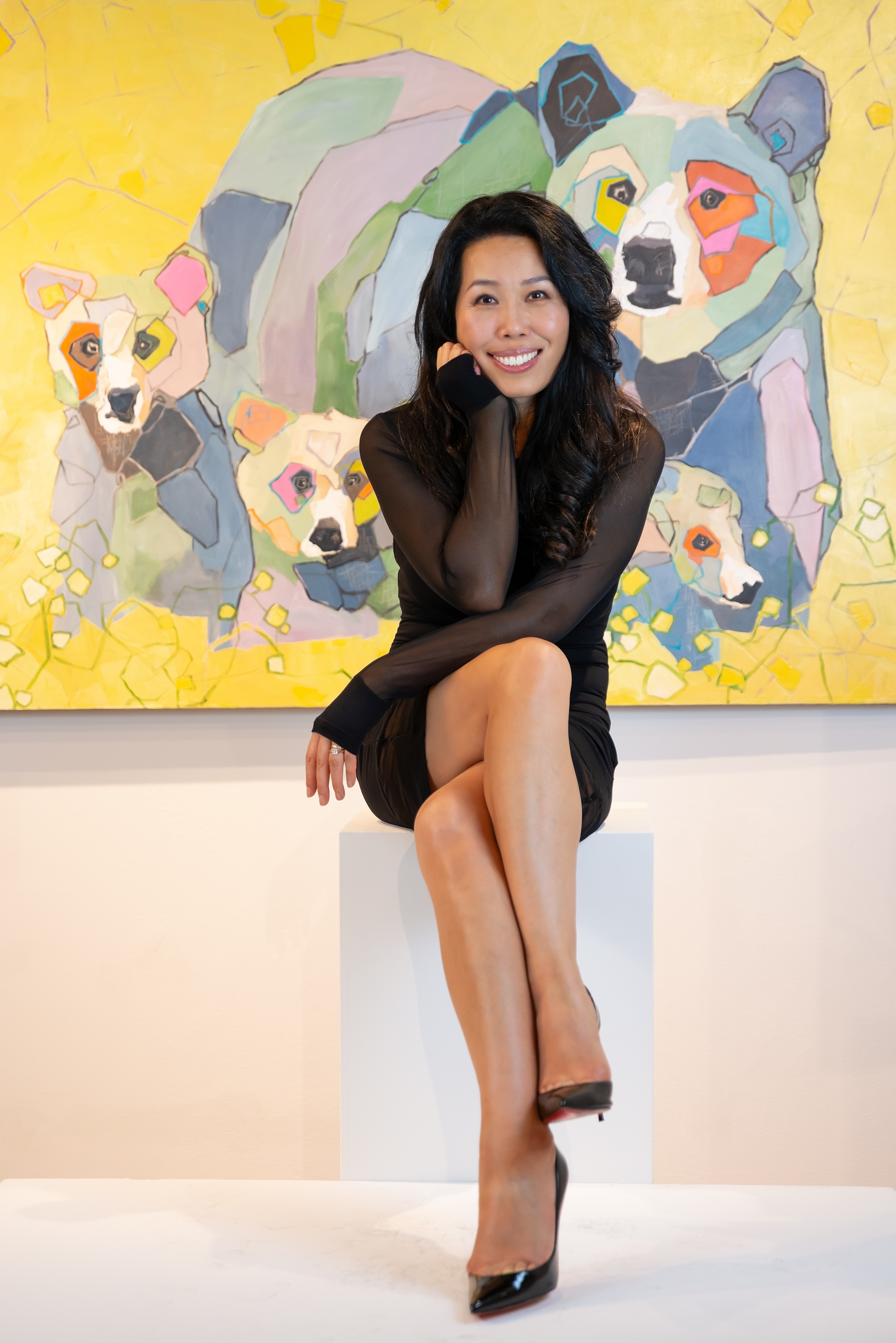 Clara posing with the bears painting in her EBA studio for the Ottawa Life Magazine cover photo shoot.